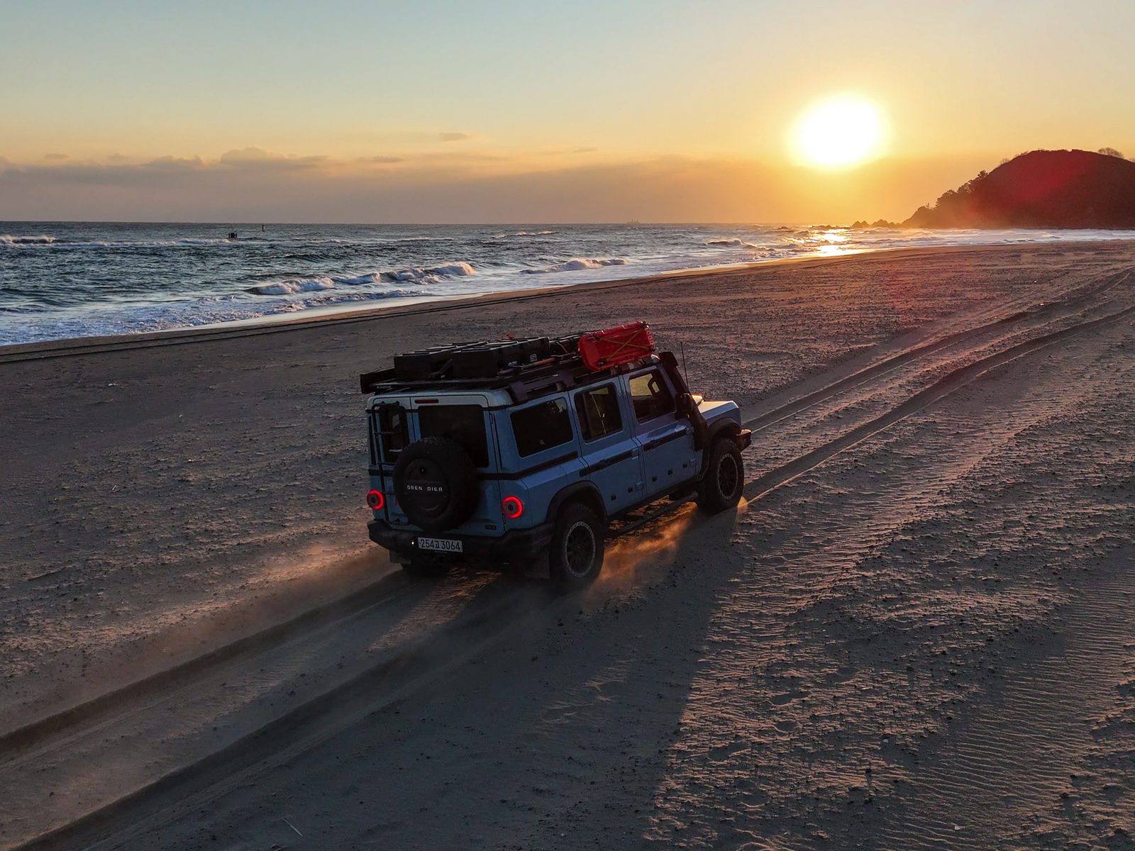 Sunset drive on shoreline